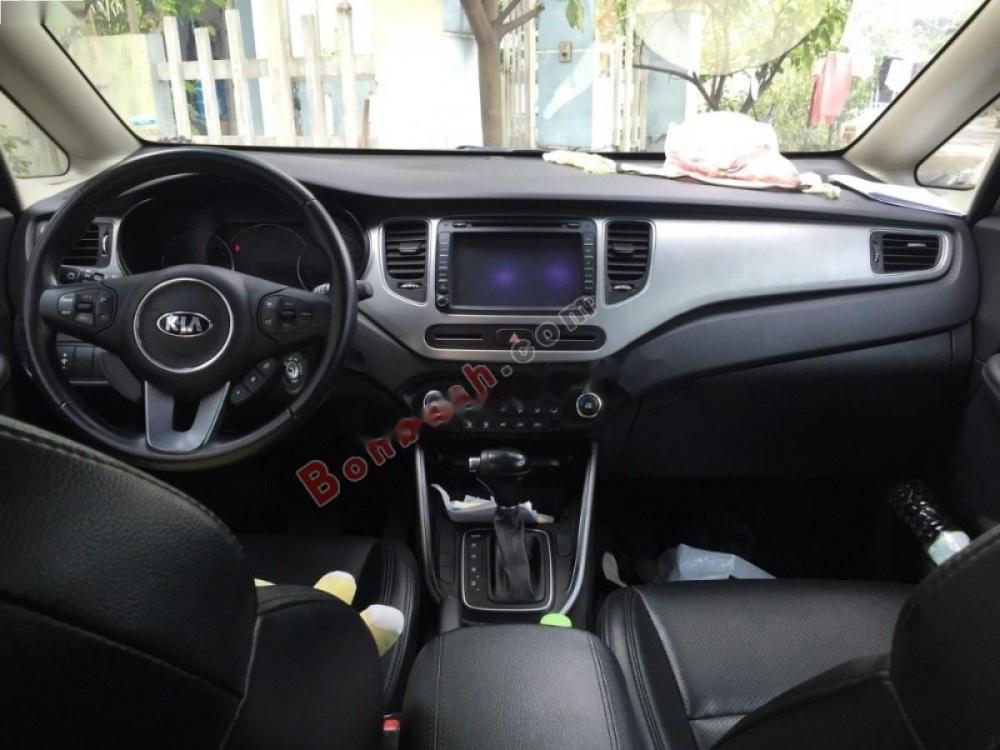 Kia Rondo GAT  2015 - Cần bán lại xe Kia Rondo GAT đời 2015, màu đen ít sử dụng, 590 triệu