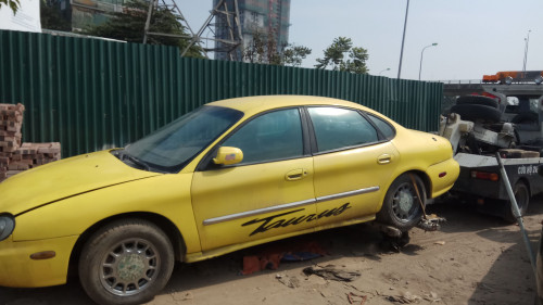 Ford Taurus   AT  1997 - Cần bán lại xe Ford Taurus AT đời 1997, màu vàng, 150tr