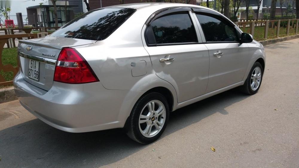 Chevrolet Aveo LTZ 1.5 AT 2014 - Bán ô tô Chevrolet Aveo LTZ 1.5 AT đời 2014, màu bạc xe gia đình