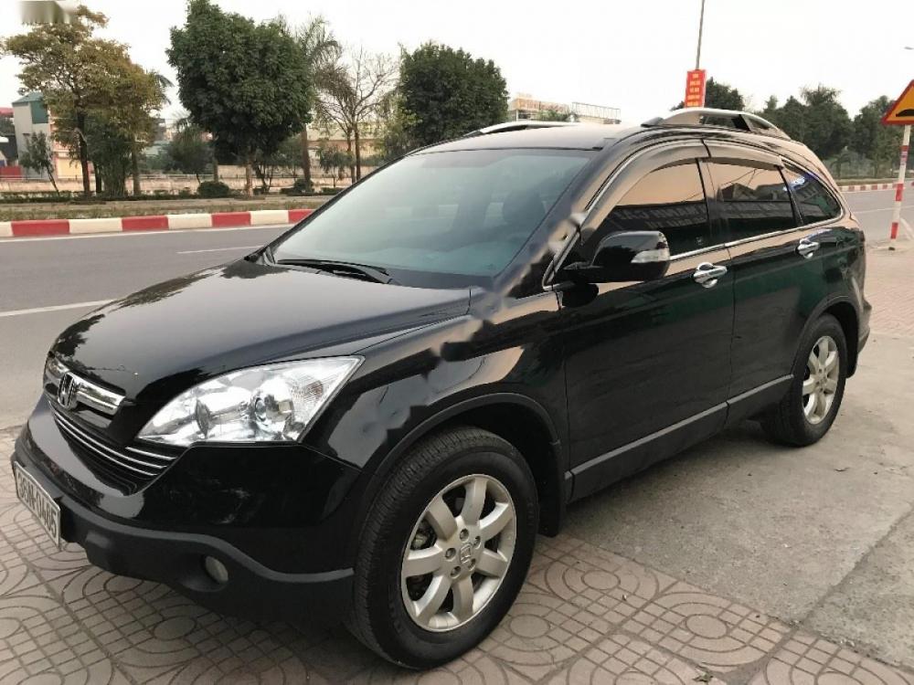 Honda CR V 2.4 AT 2009 - Cần bán xe Honda CR V 2.4 AT sản xuất 2009, màu đen số tự động, giá chỉ 570 triệu