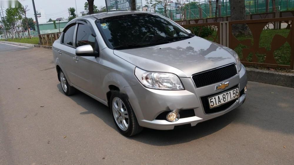 Chevrolet Aveo LTZ 1.5 AT 2014 - Bán ô tô Chevrolet Aveo LTZ 1.5 AT đời 2014, màu bạc xe gia đình