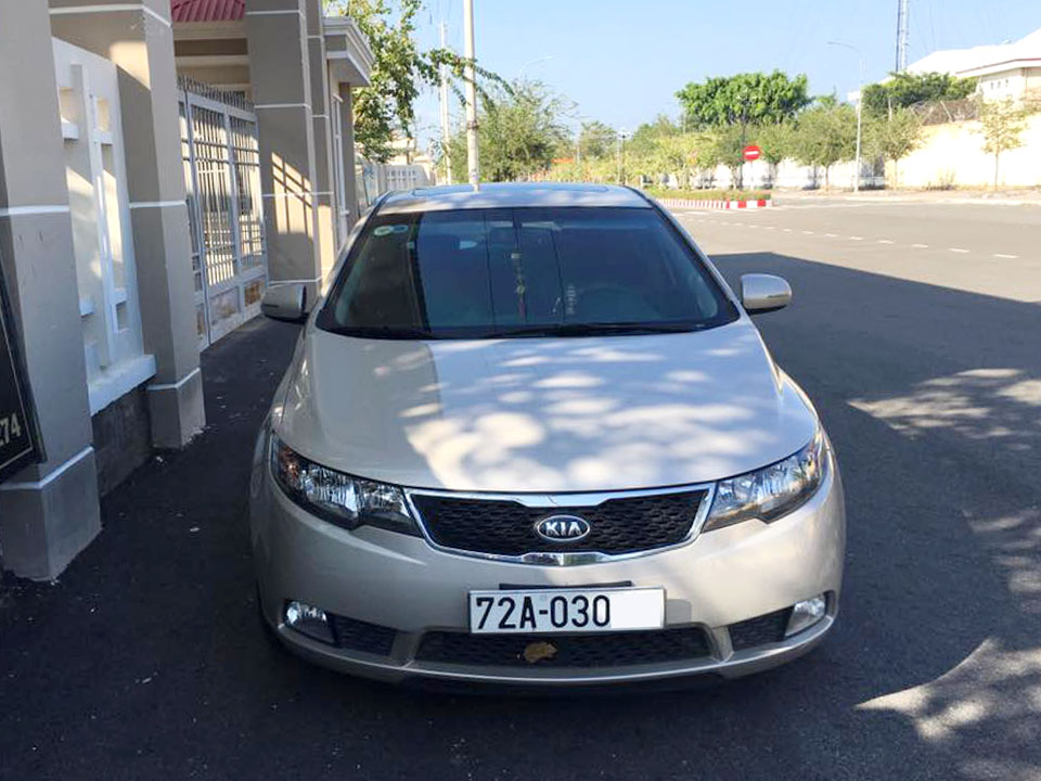 Kia Forte SX AT 1.6 2012 - Bán Kia Forte 2012, màu vàng cát