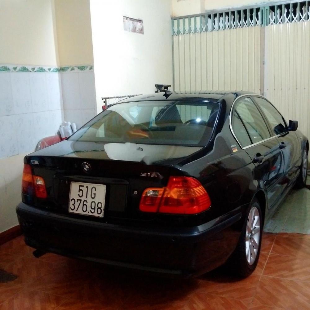 BMW 3 Series 318i 2005 - Bán ô tô BMW 3 Series 318i sản xuất 2005, màu đen số tự động, 310 triệu