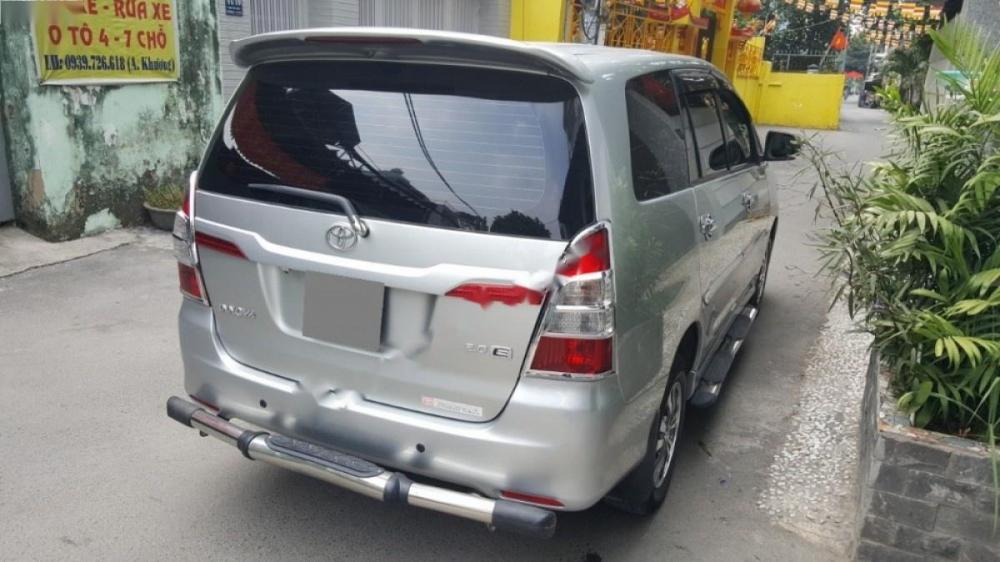 Toyota Innova V 2014 - Bán Toyota Innova V năm 2014, màu bạc như mới