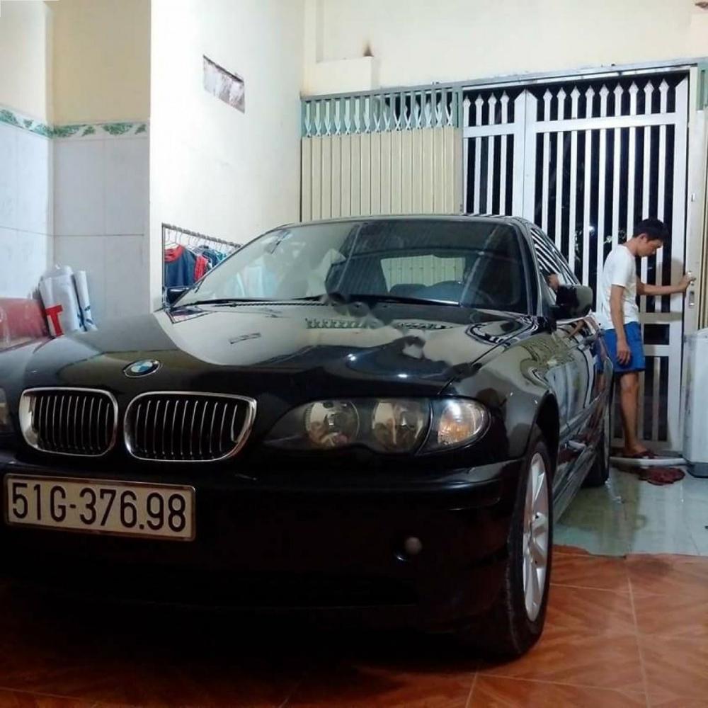 BMW 3 Series 318i 2005 - Bán ô tô BMW 3 Series 318i sản xuất 2005, màu đen số tự động, 310 triệu