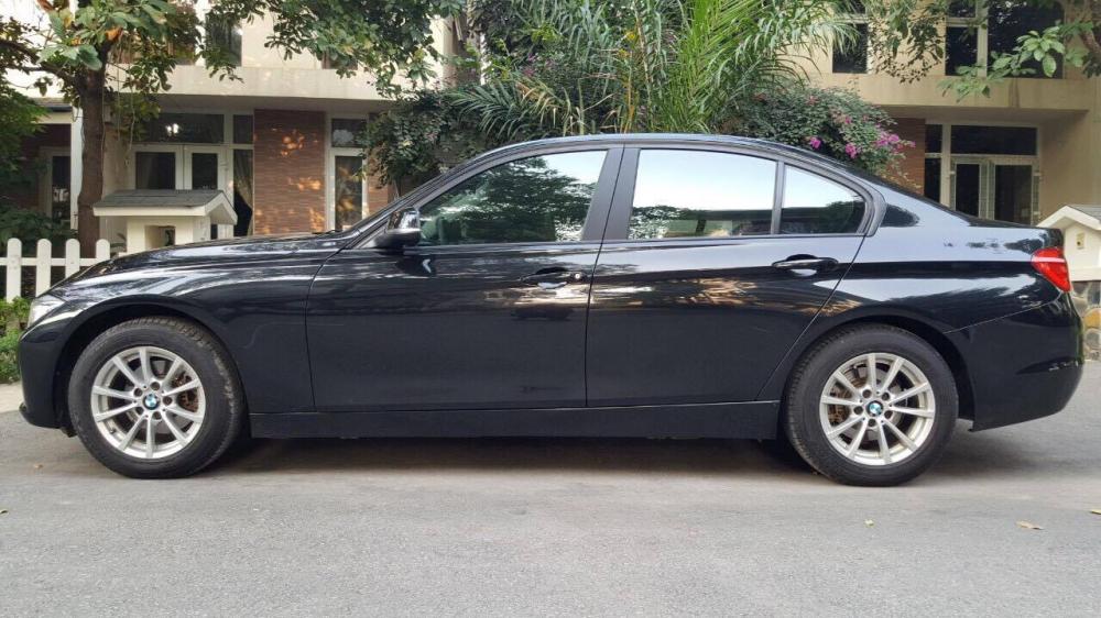 BMW 3 Series 320i 2013 - Bán ô tô BMW 3 Series đời 2013, màu đen, nhập khẩu