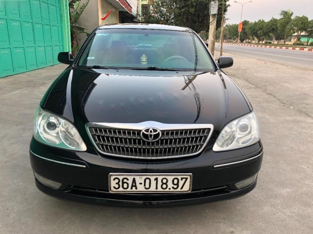 Toyota Camry 2.4G 2004 - Bán Toyota Camry 2.4G sản xuất năm 2004, màu đen