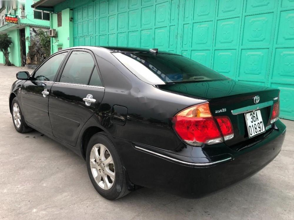 Toyota Camry 2.4G 2004 - Bán Toyota Camry 2.4G sản xuất năm 2004, màu đen