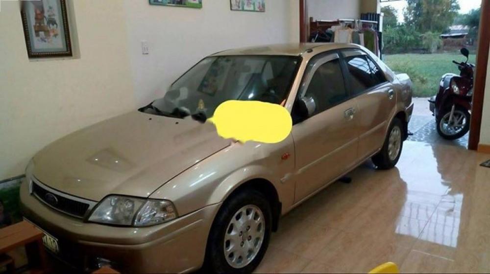 Ford Laser Delu 1.6 MT 2001 - Bán Ford Laser Delu 1.6 MT 2001, màu vàng cát