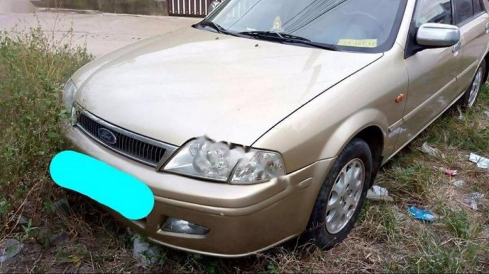 Ford Laser Delu 1.6 MT 2001 - Bán Ford Laser Delu 1.6 MT 2001, màu vàng cát