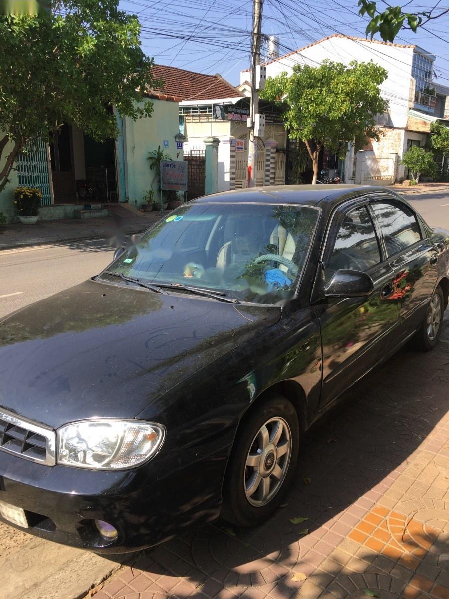 Kia Spectra 2005 - Bán xe Kia Spectra sản xuất năm 2005, màu đen, xe nhập, giá chỉ 130 triệu