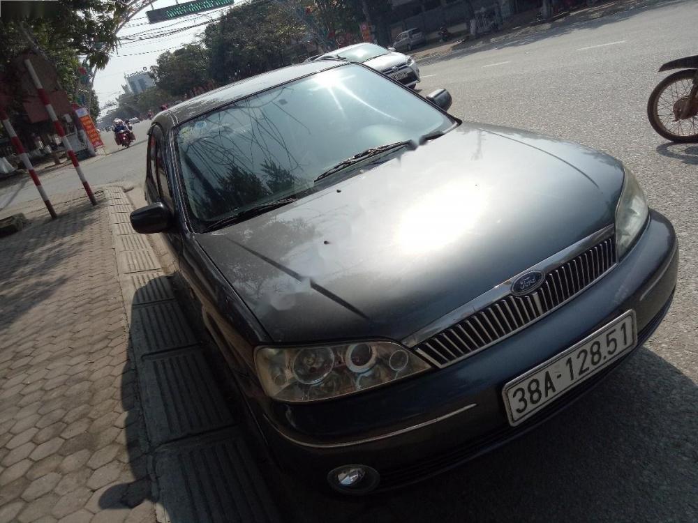 Ford Laser Ghia 1.8 MT 2003 - Bán Ford Laser Ghia 1.8 MT năm 2003, màu xám giá cạnh tranh