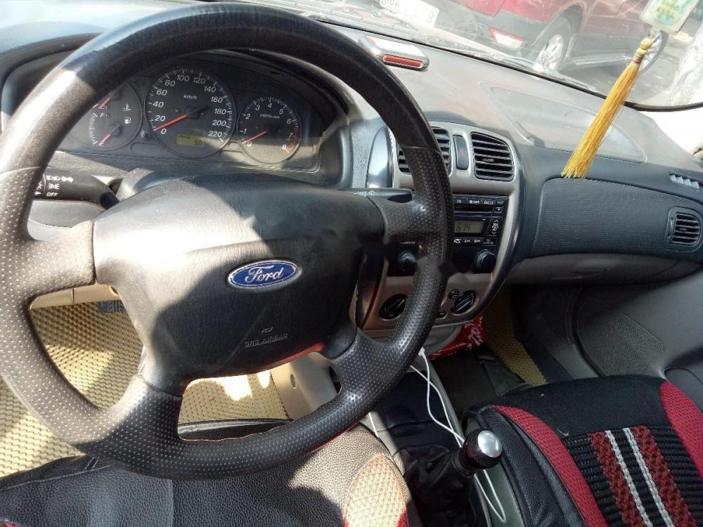 Ford Laser Ghia 1.8 MT 2003 - Bán Ford Laser Ghia 1.8 MT năm 2003, màu xám giá cạnh tranh