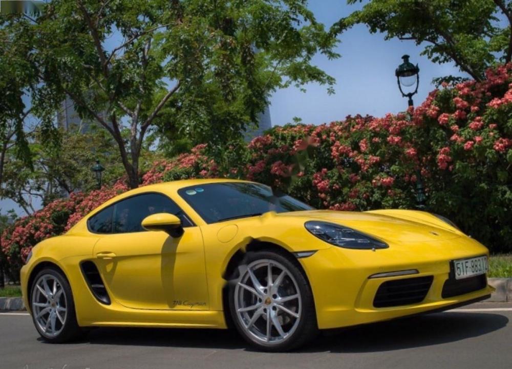 Porsche Cayman 718 2017 - Cần bán lại xe Porsche Cayman 718 2017, màu vàng, nhập khẩu nguyên chiếc như mới