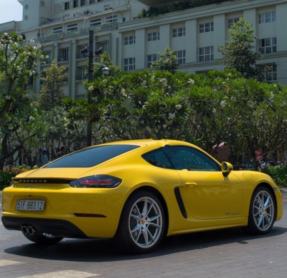 Porsche Cayman 718 2017 - Cần bán lại xe Porsche Cayman 718 2017, màu vàng, nhập khẩu nguyên chiếc như mới