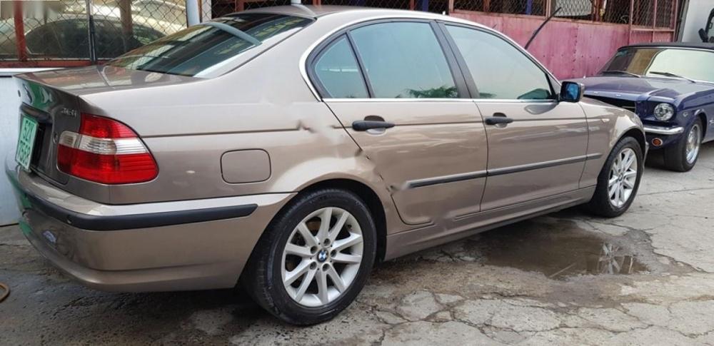 BMW 3 Series 318i 2004 - Bán BMW 3 Series 318i sản xuất 2004, màu vàng, xe nhập