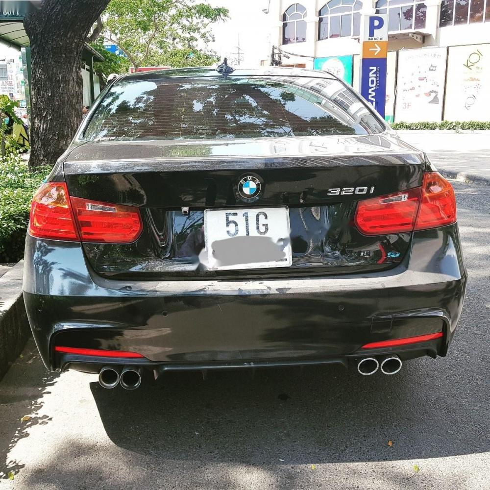 BMW 3 Series 320i 2014 - Bán xe BMW 3 Series 320i đời 2014, màu đen, xe nhập 