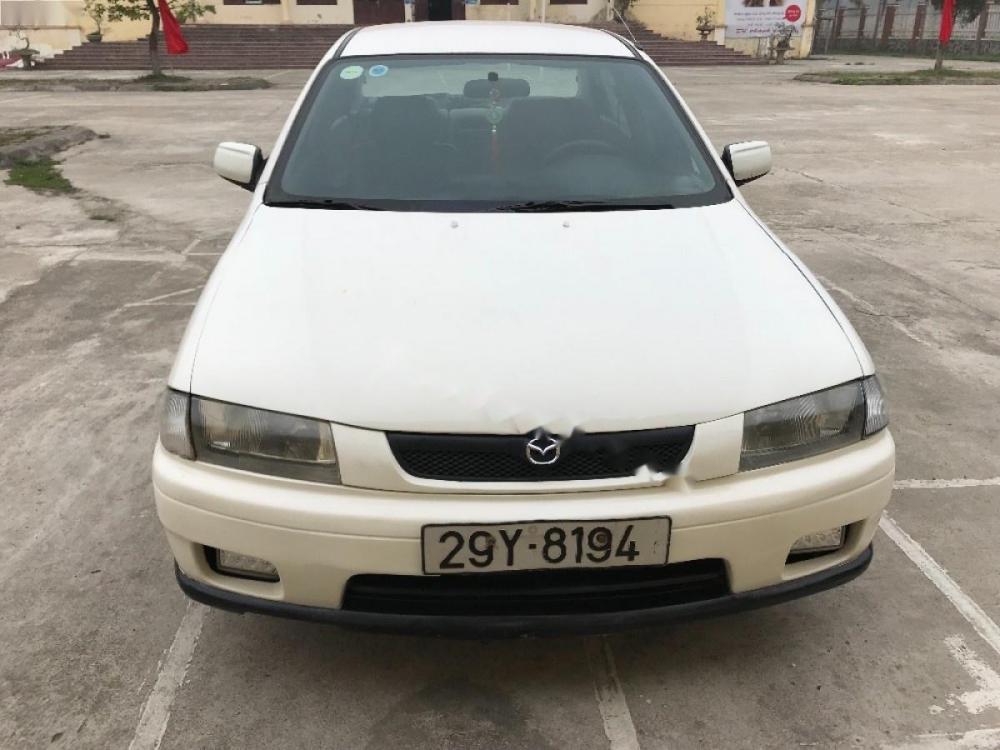 Mazda 323 MT 2000 - Bán xe Mazda 323 MT năm sản xuất 2000, màu trắng