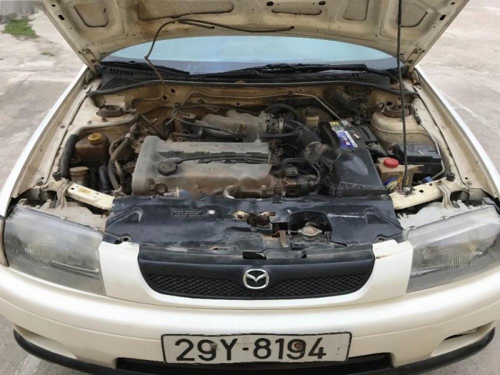 Mazda 323 MT 2000 - Bán xe Mazda 323 MT năm sản xuất 2000, màu trắng