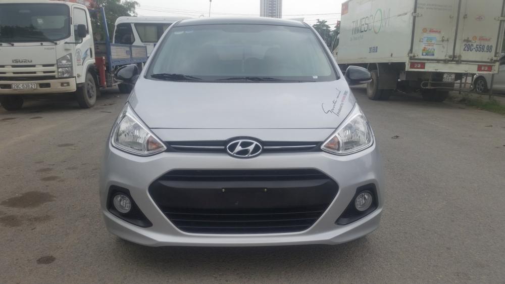 Hyundai Grand i10 1.2AT 2016 - Cần bán gấp Hyundai Grand i10 1.2AT năm 2016, màu bạc, nhập khẩu chính hãng, chính chủ