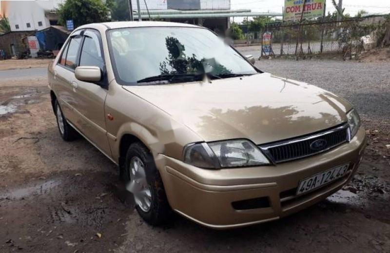 Ford Laser Delu 1.6 MT 2002 - Bán ô tô Ford Laser Delu 1.6 MT sản xuất năm 2002, màu vàng