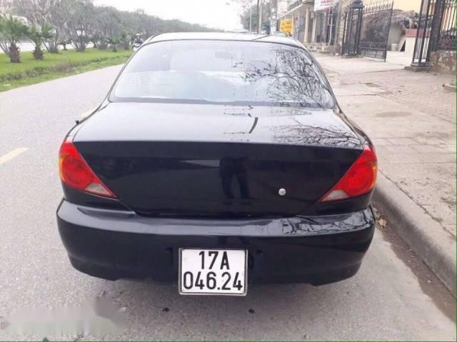 Kia Spectra 2004 - Chính chủ bán ô tô Kia Spectra đời 2004, màu xanh