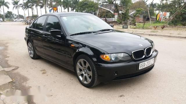 BMW 3 Series  318i  2002 - Bán xe BMW 3 Series 318i sản xuất 2002, màu đen  