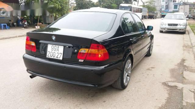 BMW 3 Series  318i  2002 - Bán xe BMW 3 Series 318i sản xuất 2002, màu đen  