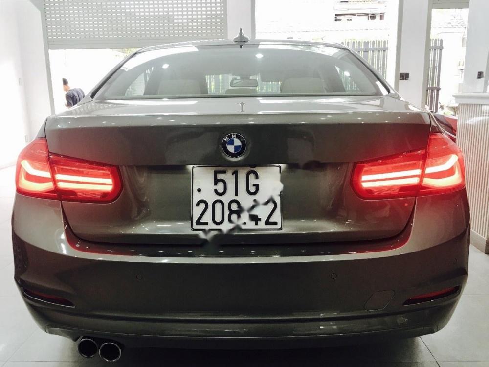 BMW 3 Series 320i 2015 - Cần bán xe BMW 3 Series 320i 2015, màu nâu, xe nhập như mới