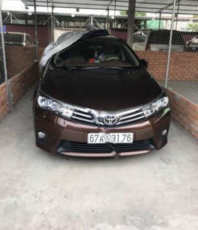 Toyota Corolla altis 1.8G MT 2014 - Bán ô tô Toyota Corolla Altis 1.8G MT năm 2014, màu nâu