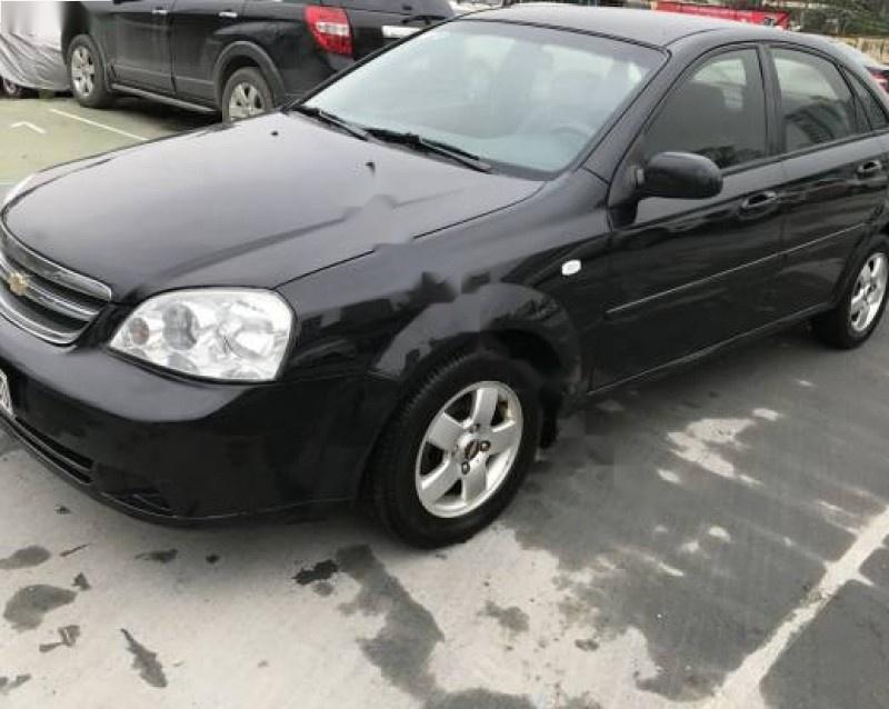 Chevrolet Lacetti 1.6 2012 - Cần bán gấp Chevrolet Lacetti 1.6 đời 2012, màu đen xe gia đình