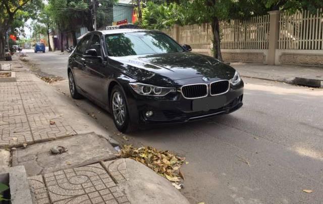 BMW 3 Series  320i  2014 - Chính chủ bán xe BMW 3 Series 320i sản xuất 2014, màu đen