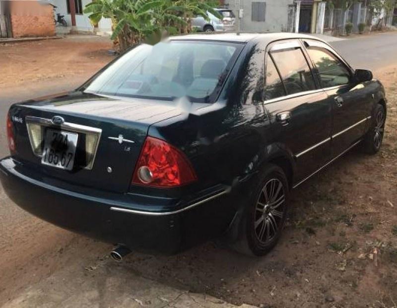 Ford Laser Ghia 1.8 MT 2003 - Cần bán Ford Laser Ghia 1.8 MT sản xuất 2003, màu xanh, giá chỉ 262 triệu