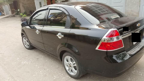 Chevrolet Aveo   1.5 AT  2014 - Bán Chevrolet Aveo 1.5 AT đời 2014, màu đen