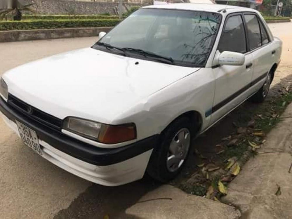 Mazda 323 1.6 MT 1995 - Bán Mazda 323 1.6 MT sản xuất 1995, màu trắng 