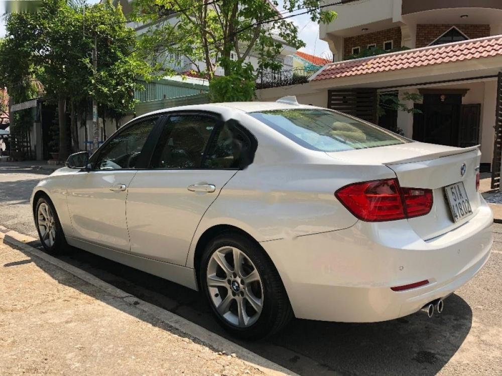 BMW 3 Series 328i 2012 - Cần bán BMW 3 Series 328i đời 2012, màu trắng, xe nhập