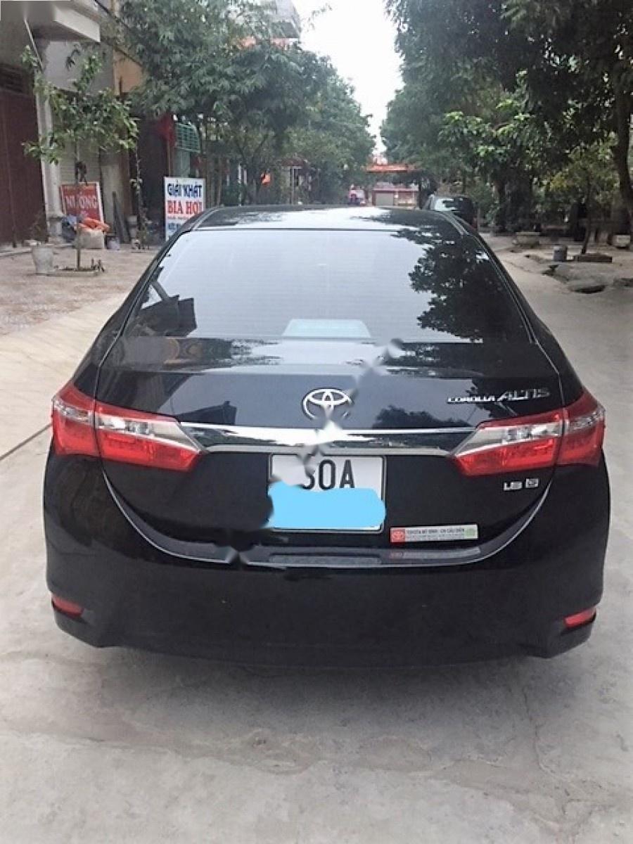 Toyota Corolla altis 2015 - Cần bán Toyota Corolla Altis sản xuất 2015, màu đen