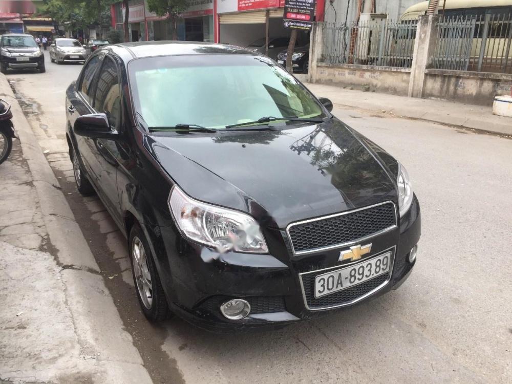 Chevrolet Aveo LT 2015 - Cần bán Chevrolet Aveo LT năm 2015, màu đen chính chủ, giá chỉ 319 triệu