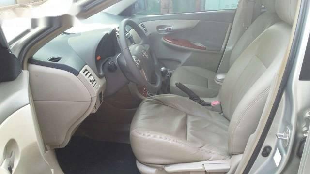 Toyota Corolla altis 1.8 G  2009 - Bán Toyota Corolla altis 1.8 G đời 2009, màu bạc 