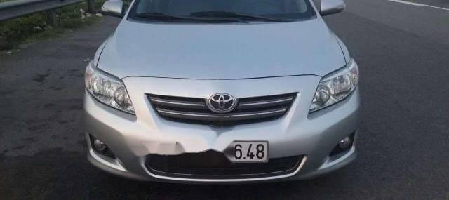 Toyota Corolla altis 1.8 G  2009 - Bán Toyota Corolla altis 1.8 G đời 2009, màu bạc 