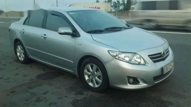 Toyota Corolla altis 1.8 G  2009 - Bán Toyota Corolla altis 1.8 G đời 2009, màu bạc 