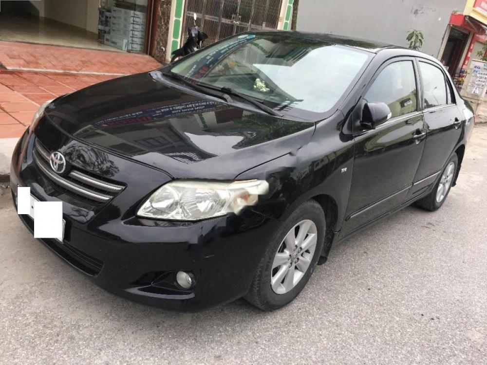 Toyota Corolla altis 1.8G MT 2009 - Bán Toyota Corolla altis 1.8G MT đời 2009, màu đen chính chủ giá cạnh tranh