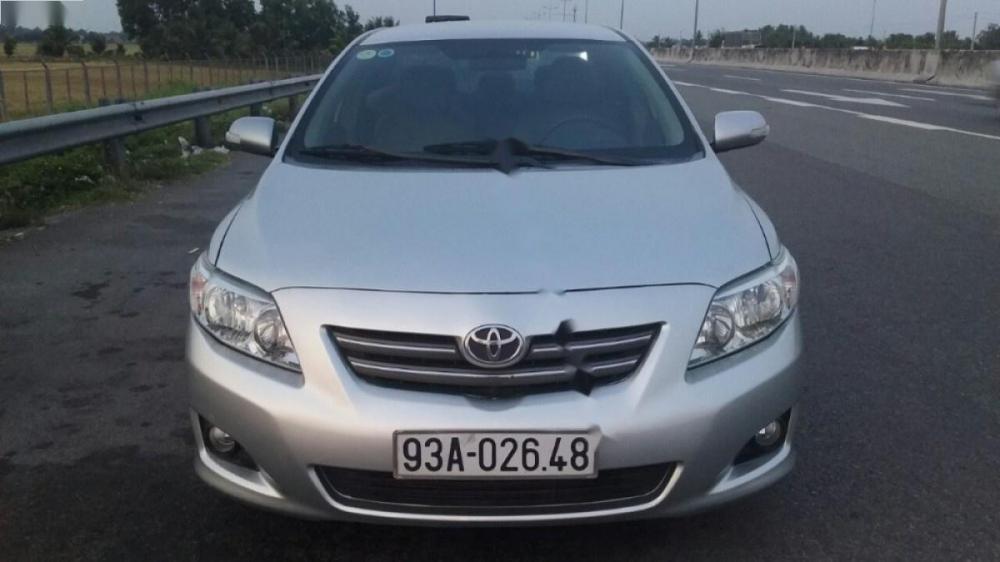 Toyota Corolla altis G 2009 - Cần bán xe Toyota Corolla altis G đời 2009, màu bạc