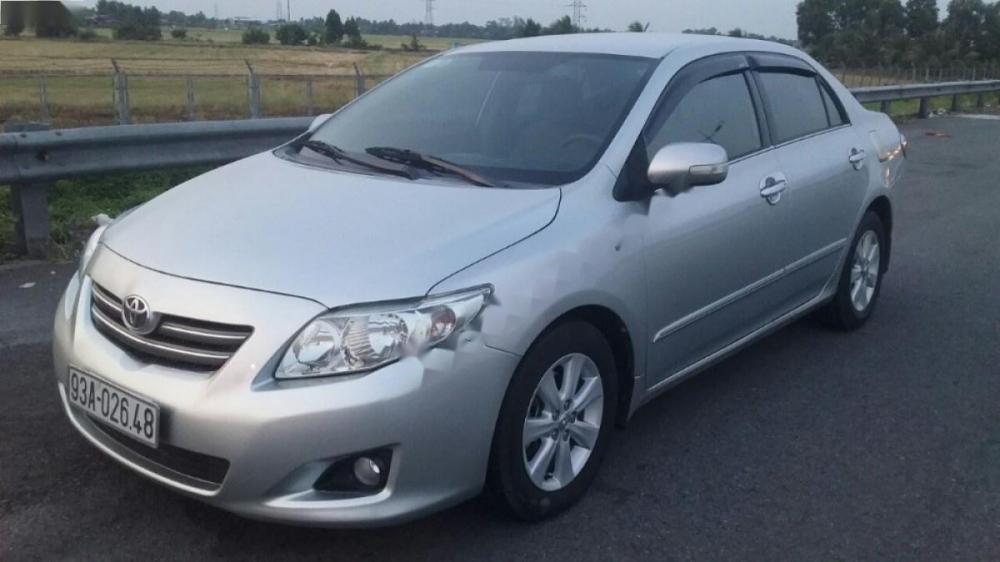 Toyota Corolla altis G 2009 - Cần bán xe Toyota Corolla altis G đời 2009, màu bạc