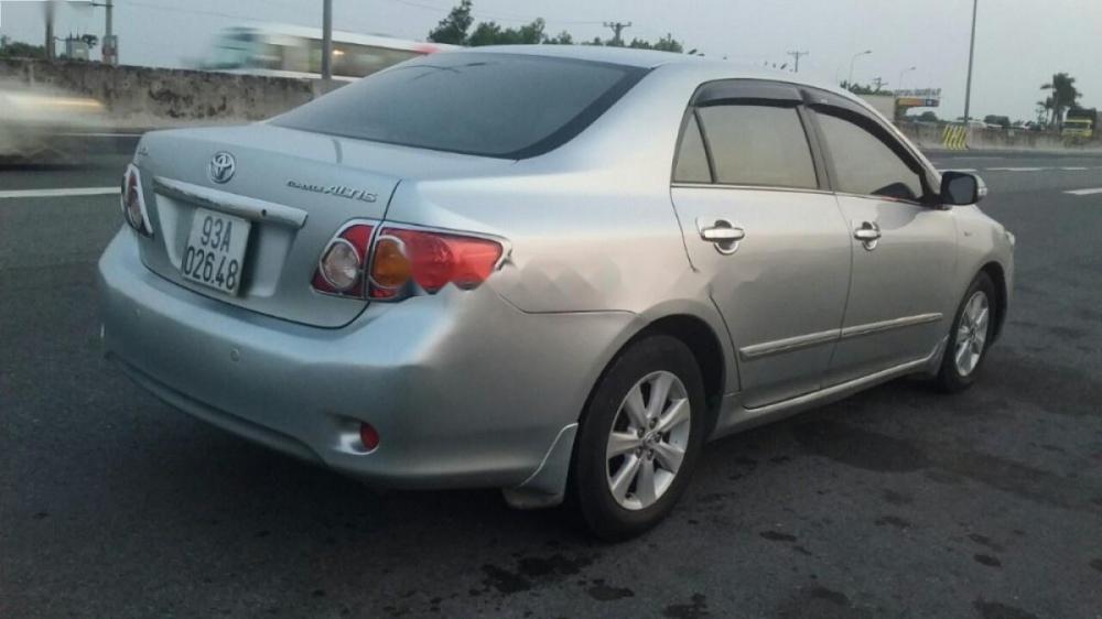 Toyota Corolla altis G 2009 - Cần bán xe Toyota Corolla altis G đời 2009, màu bạc