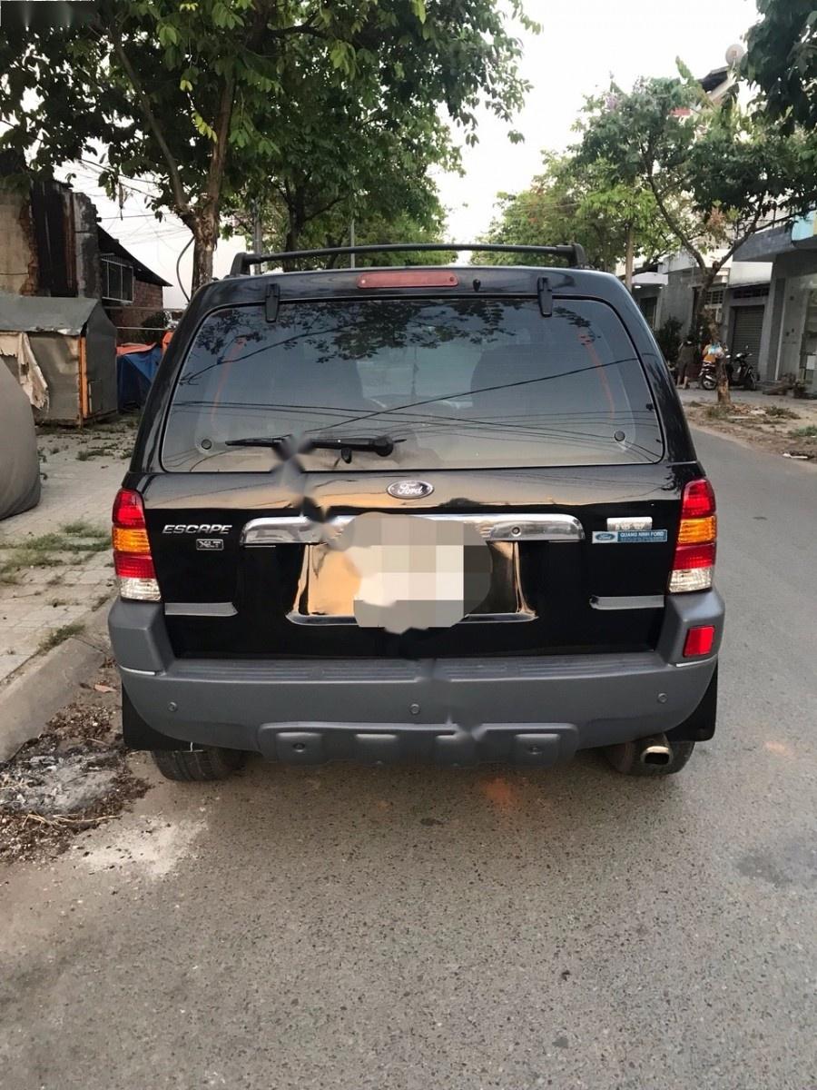 Ford Escape 2004 - Cần bán Ford Escape đời 2004, màu đen chính chủ, giá chỉ 170 triệu