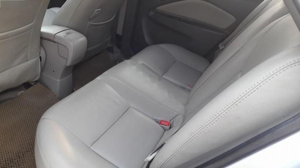 Toyota Vios 1.5E 2013 - Cần bán xe Toyota Vios E đời 2013, màu bạc chính chủ