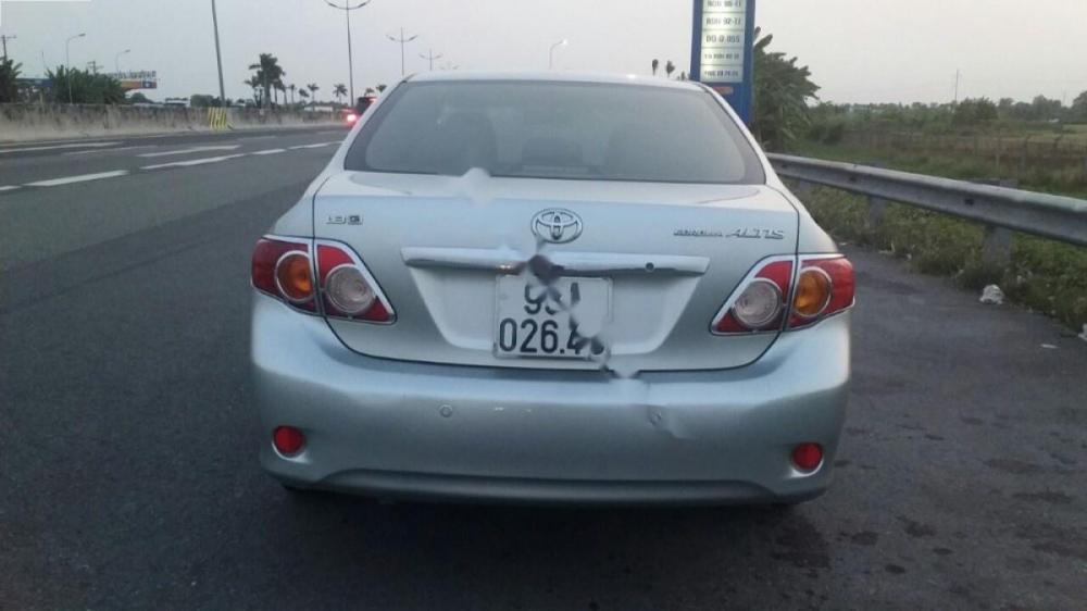 Toyota Corolla altis G 2009 - Cần bán xe Toyota Corolla altis G đời 2009, màu bạc