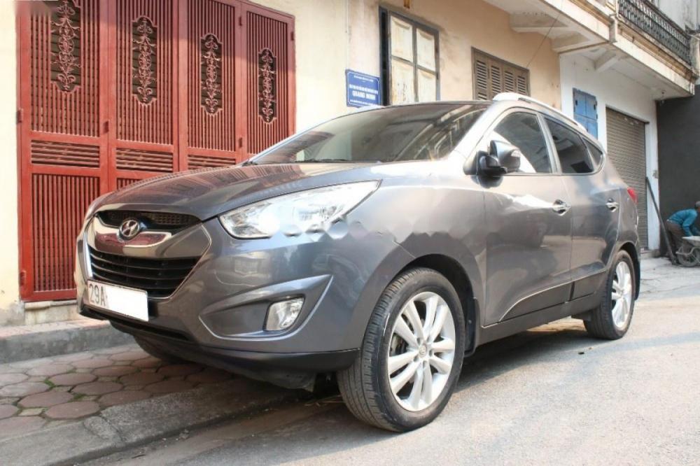 Hyundai Tucson 2.0 AT 4WD 2010 - Bán xe Hyundai Tucson 2.0 AT 4WD đời 2010, màu xám, nhập khẩu á tốt.