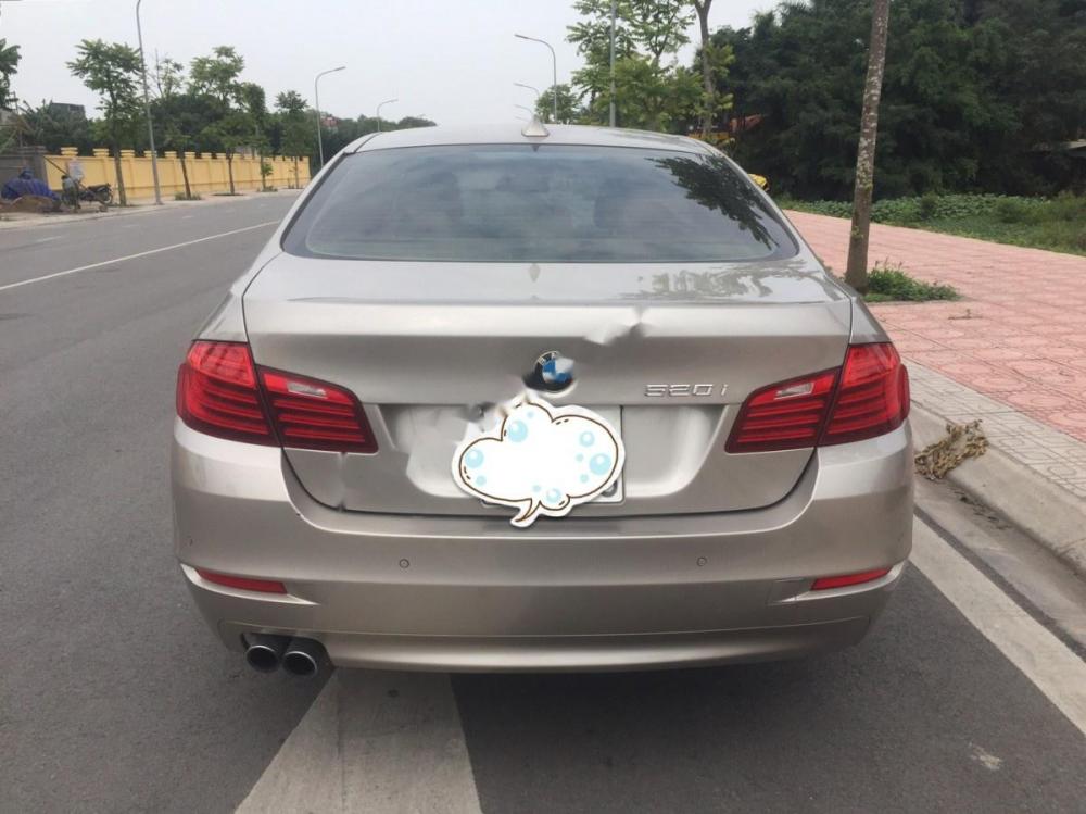 BMW 5 Series 520i 2014 - Bán BMW 5 Series 520i sản xuất năm 2014, màu vàng, nhập khẩu